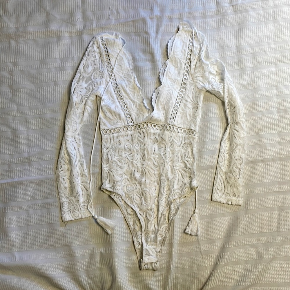 White lace body suit. Never worn.